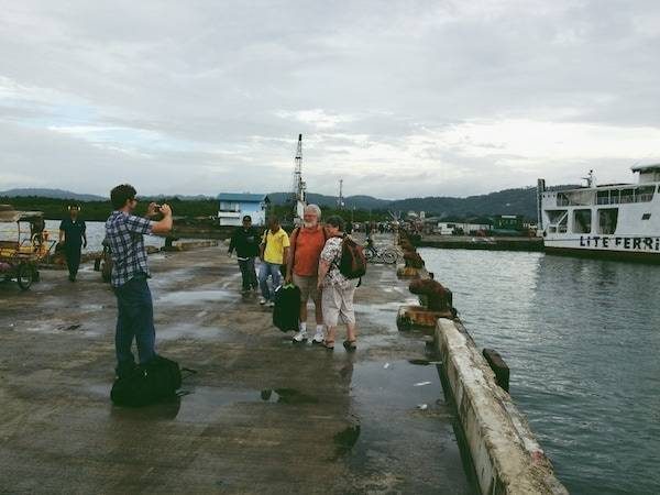 People near an ocean.