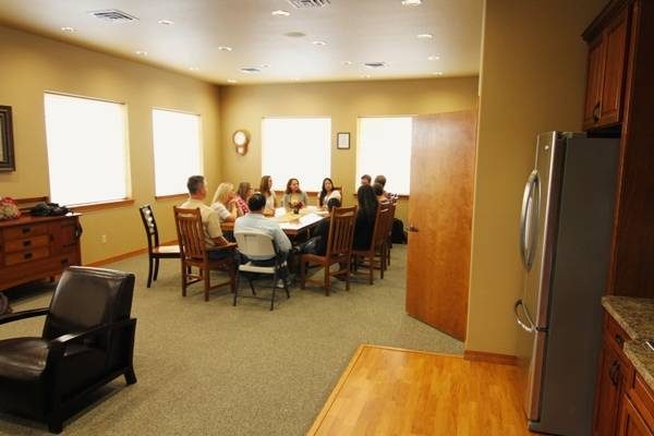 People around a table.