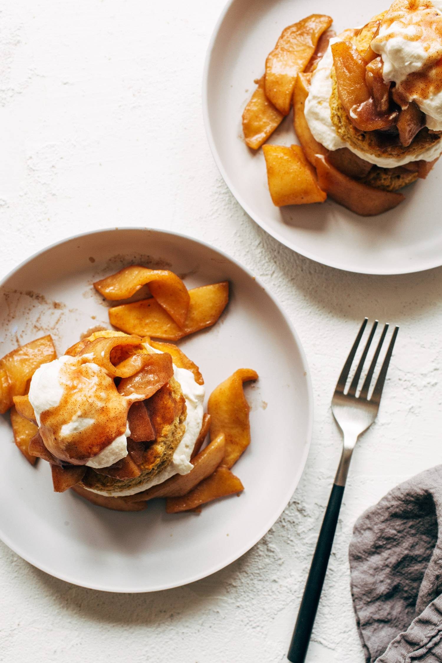 Pumpkin shortcakes on plates with a fork.