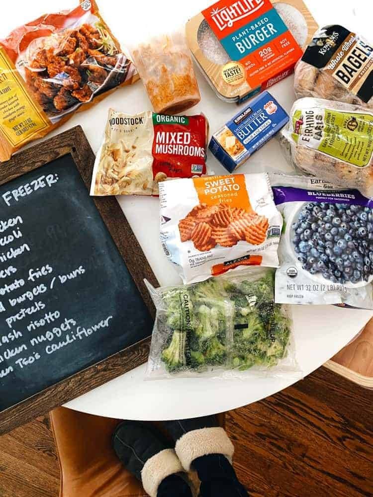 Bags of foods on a white table.
