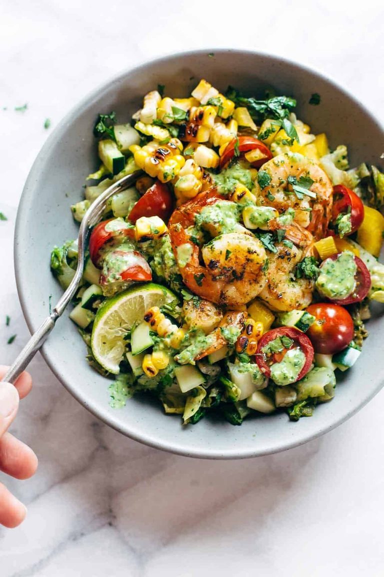 Glowing Grilled Summer Detox Salad in a bowl with a fork.