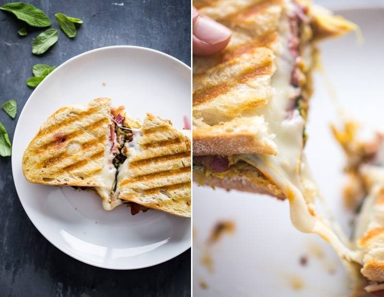 Turkey Panini on a white plate with melted cheese.