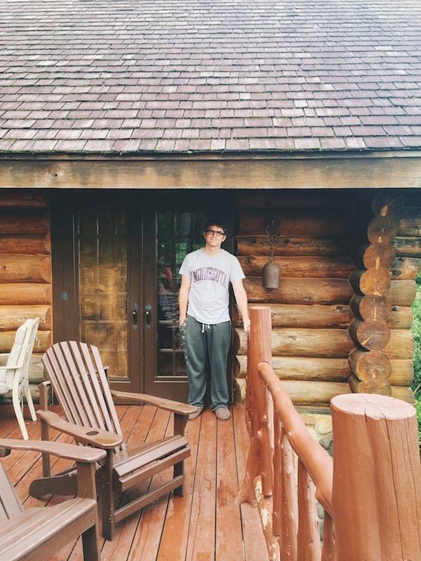 Man standing on a porch.