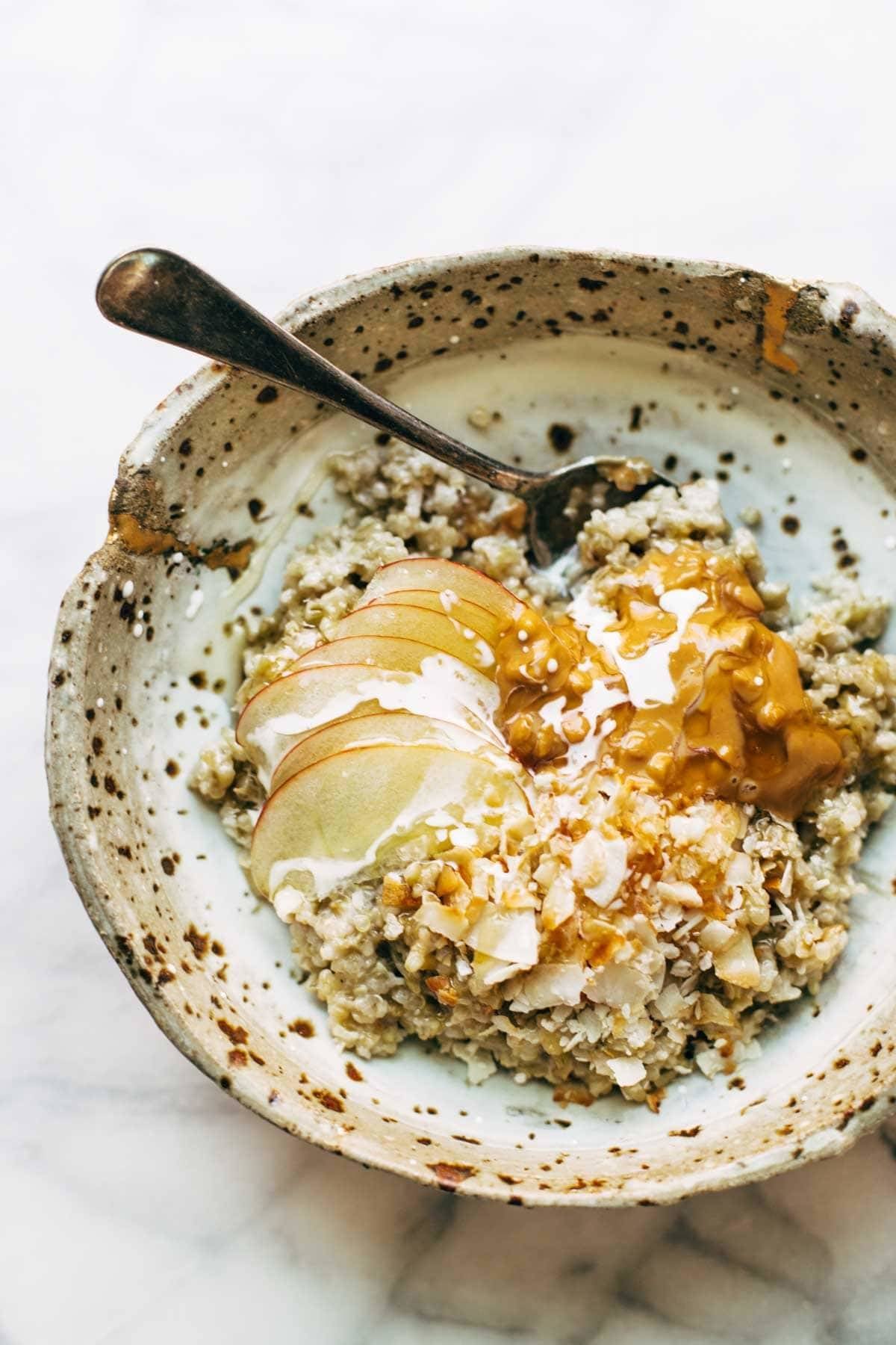 Simple Coconut Breakfast Porridge - a wholesome and cozy breakfast recipe with quinoa, oats, coconut milk, and one surprise ingredient! | pinchofyum.com Simple Coconut Breakfast Porridge - a wholesome and cozy breakfast recipe with quinoa, oats, coconut milk, and one surprise ingredient! | pinchofyum.com